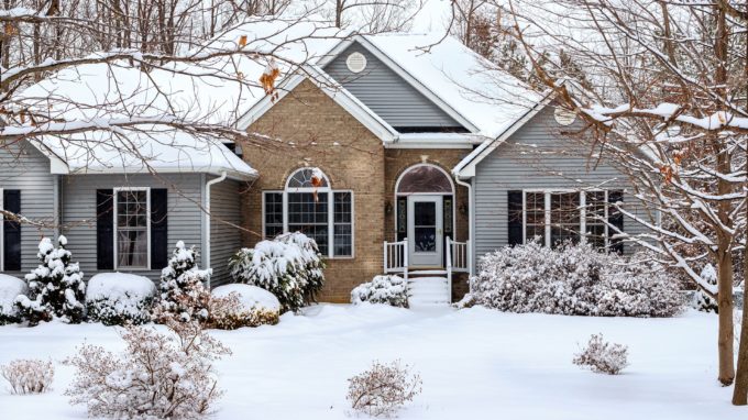 Home covered in snow in the winter