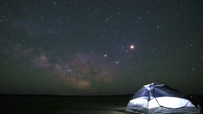 Tent under starry sky