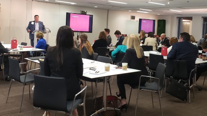 Doug Barnett speaking to employees at a Greater Washington Employee Relocation Councilmeeting