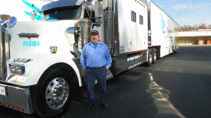 Dennis Putnam stands outside his truck at Stafford's Corporate Headquarters in Stafford, VA.