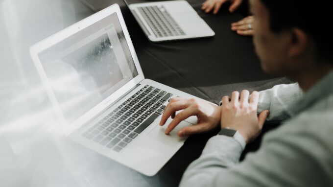 Person working on a laptop.