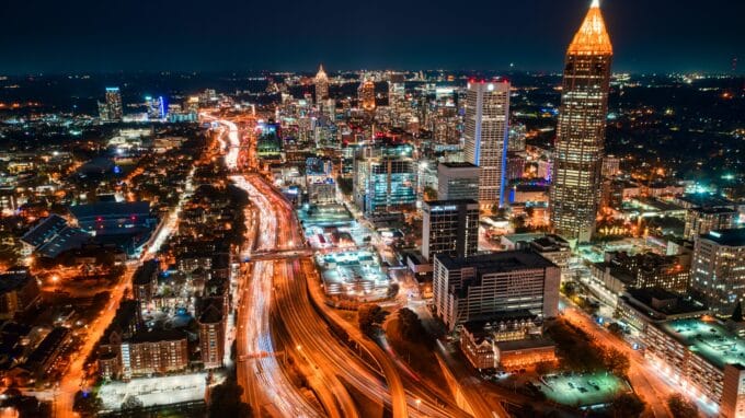 Overview of Atlanta skyline at night.