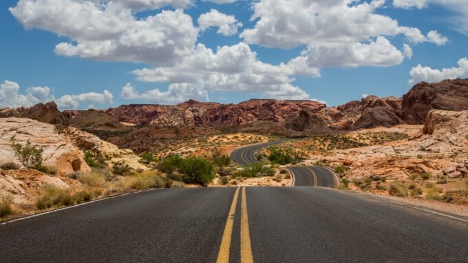 Picture of open road in desert.