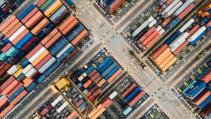 Aerial shot of shipping containers in a shipyard.