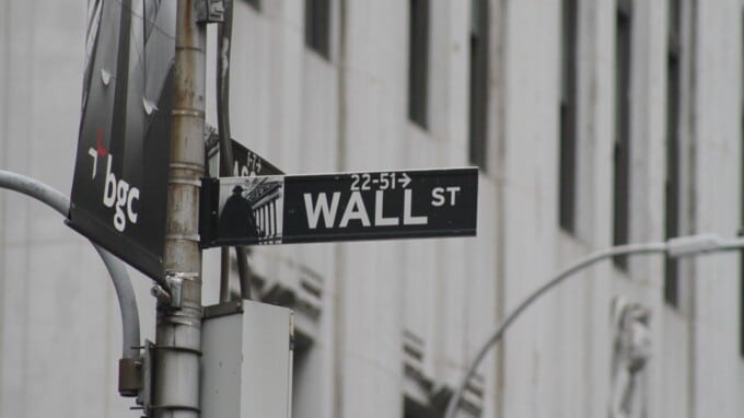 Picture of a street sign in New York for Wall Street.