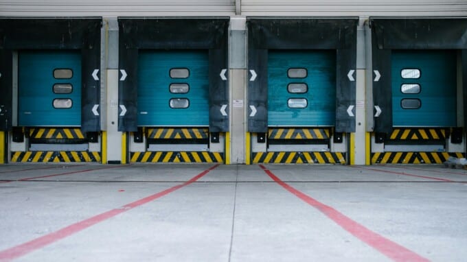 Exterior picture of a four-door loading dock.