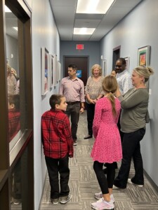 Connie meets with Stafford students who've been selected to have their artwork on display at Hilldrup.