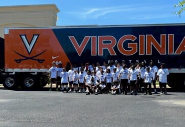 UVA football tractor trailer with Kam Robinson camp campers