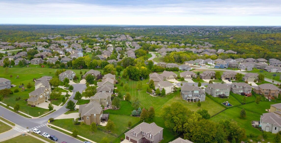 neighborhood with large houses and yards