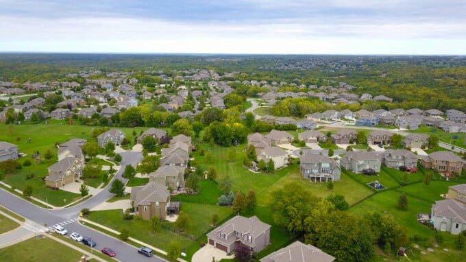 neighborhood with large houses and yards