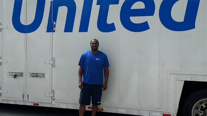 Wallace Wyatt in front of his truck