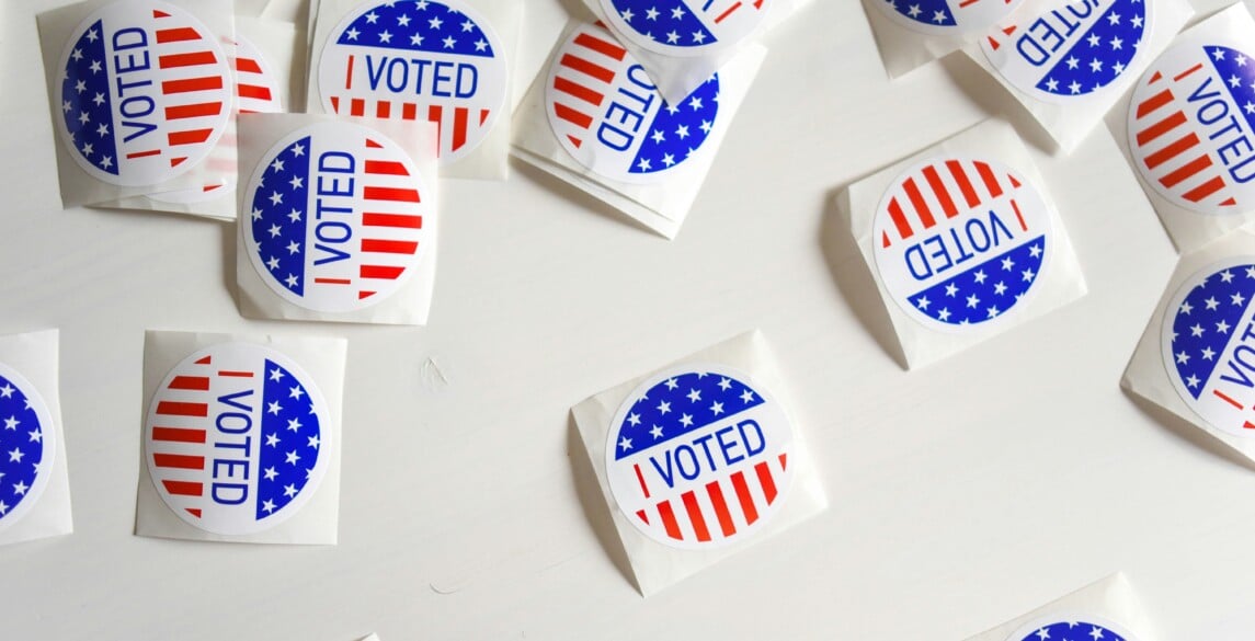 I Voted stickers on a white table