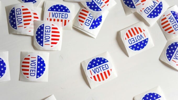 I Voted stickers on a white table