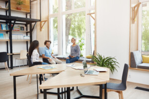 employees gather together in the office