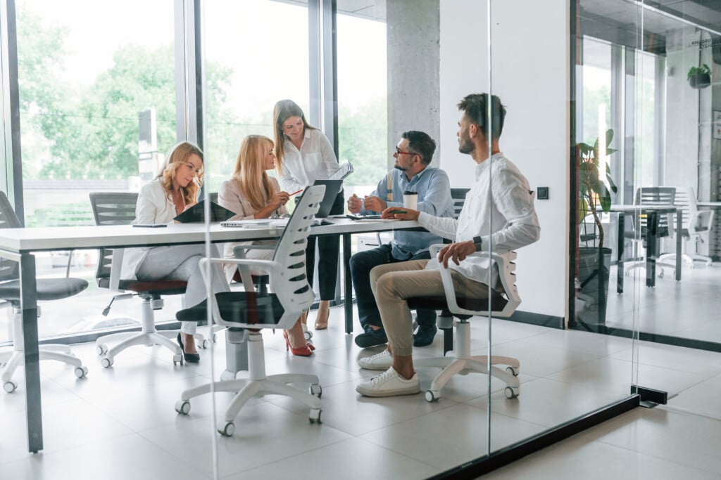 Team of employees at a conference table 