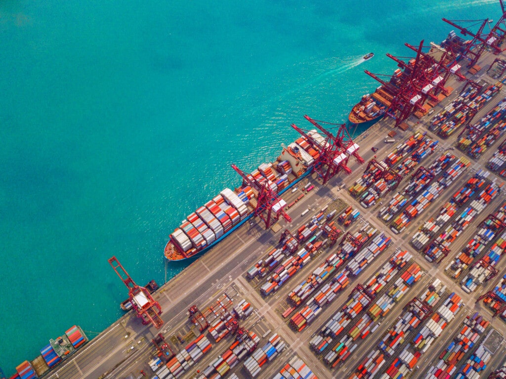 Arial view of a container cargo ship at a port of call